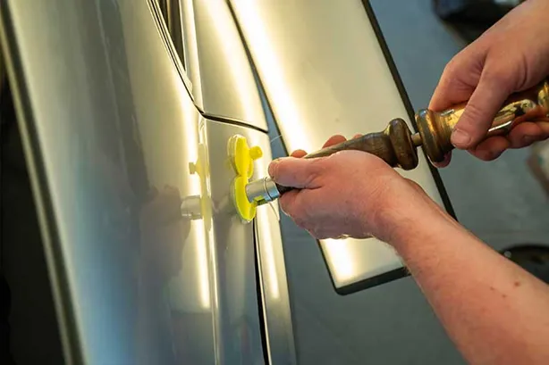 NCC Repairing the dent damage